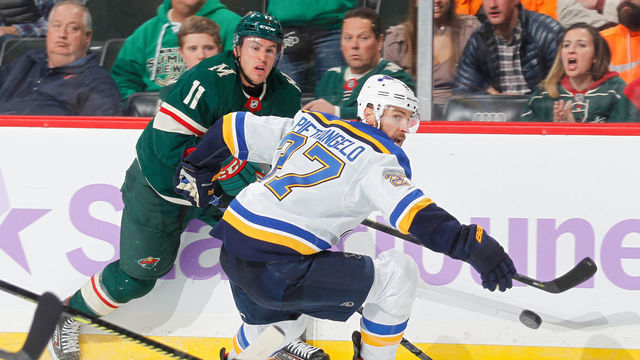 SAINT PAUL, MN - NOVEMBER 02: Zach Parise #11 of the Minnesota Wild and Alex Pietrangelo #27 of the St. Louis Blues battle for the puck during the game at the Xcel Energy Center on November 2, 2019 in Saint Paul, Minnesota.