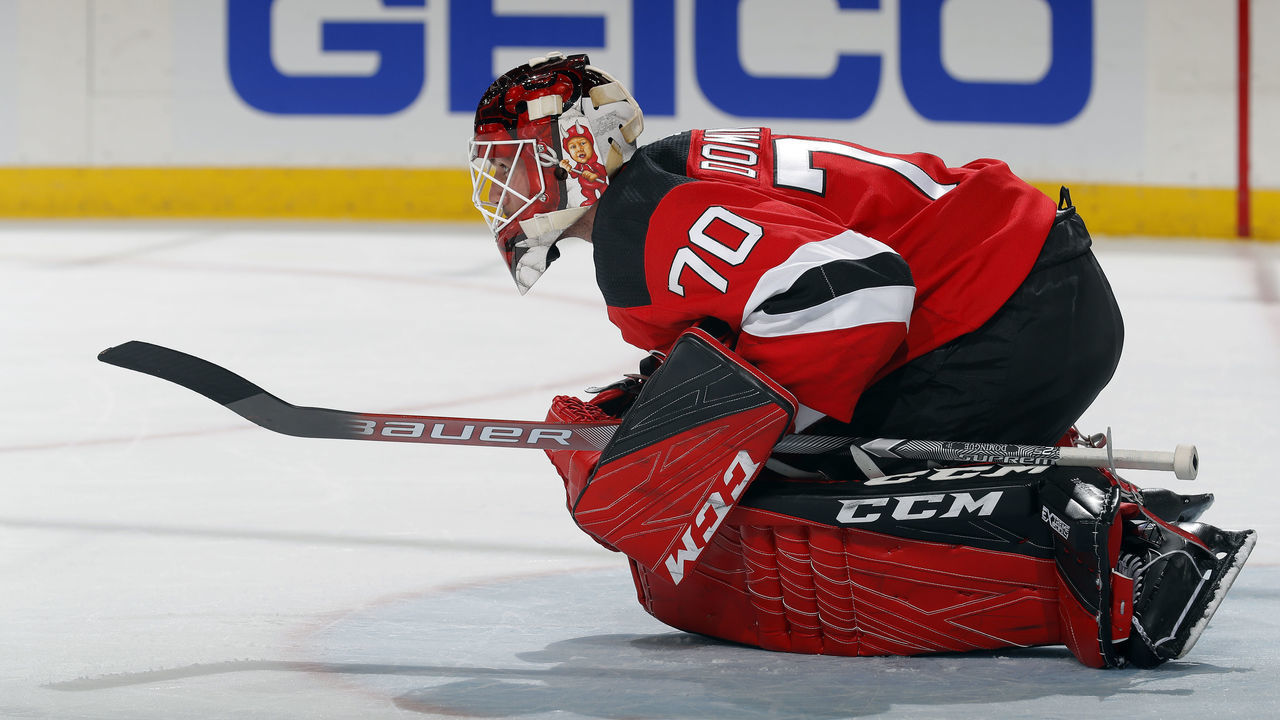 NEWARK, NJ - FEBRUARY 04: Louis Domingue #70 of the New Jersey Devils stretches against the Montreal Canadiens on February 4, 2020 at the Prudential Center in Newark, New Jersey.