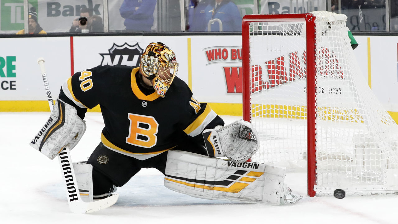 BOSTON, MA - FEBRUARY 15: Boston Bruins goalie Tuukka Rask (40) knocks a shot aside with his left pad during a game between the Boston Bruins and the Detroit Red Wings on February 15, 2020, at TD Garden in Boston, Massachusetts.