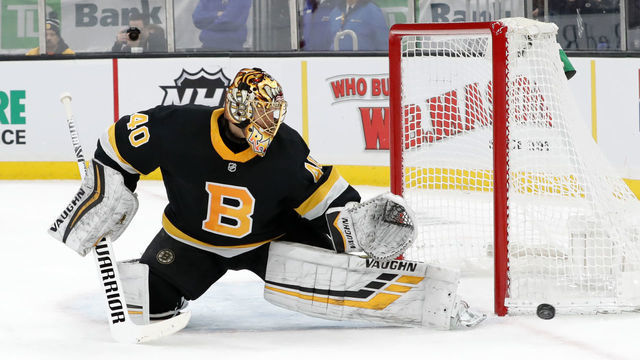 BOSTON, MA - FEBRUARY 15: Boston Bruins goalie Tuukka Rask (40) knocks a shot aside with his left pad during a game between the Boston Bruins and the Detroit Red Wings on February 15, 2020, at TD Garden in Boston, Massachusetts.