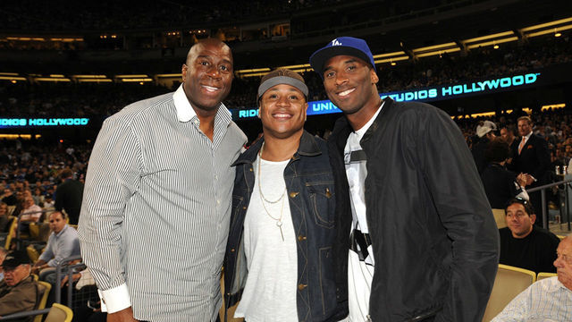 LOS ANGELES, CA - JULY 31: (L-R) Earvin "Magic" Johnson, rapper LL Cool J and Kobe Bryant of the Los Angeles Lakers attend a game between the Los Angeles Dodgers and the New York Yankees on July 31, 2013 at Dodger Stadium in Los Angeles, Caifornia.