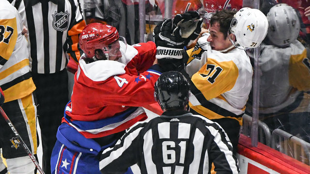 WASHINGTON, DC - FEBRUARY 23: Washington Capitals defenseman Brenden Dillon (4) fights with Pittsburgh Penguins center Evgeni Malkin (71) in the first period on February 23, 2020 at the Capital One Arena in Washington, D.C.