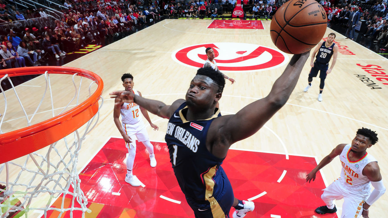 ATLANTA, GA - OCTOBER 7: Zion Williamson #1 of the New Orleans Pelicans dunks the ball against the Atlanta Hawks during a pre-season game on October 7, 2019 at State Farm Arena in Atlanta, Georgia. NOTE TO USER: User expressly acknowledges and agrees that, by downloading and/or using this Photograph, user is consenting to the terms and conditions of the Getty Images License Agreement. Mandatory Copyright Notice: Copyright 2019 NBAE