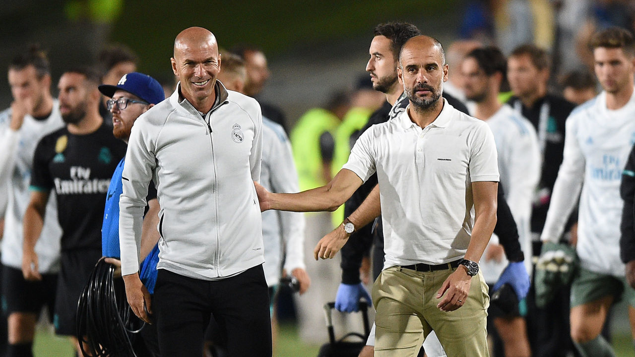LOS ANGELES, CA - JULY 26: Coach and manager Pep Guardiola (R) of Manchester City and Zinedine Zidane coach of Real Madrid greet after Manchester City defeated Real madrid, 4-1, during the International Champions Cup 2017 at Los Angeles Coliseum July 26, 2017, in Los Angeles, California.
