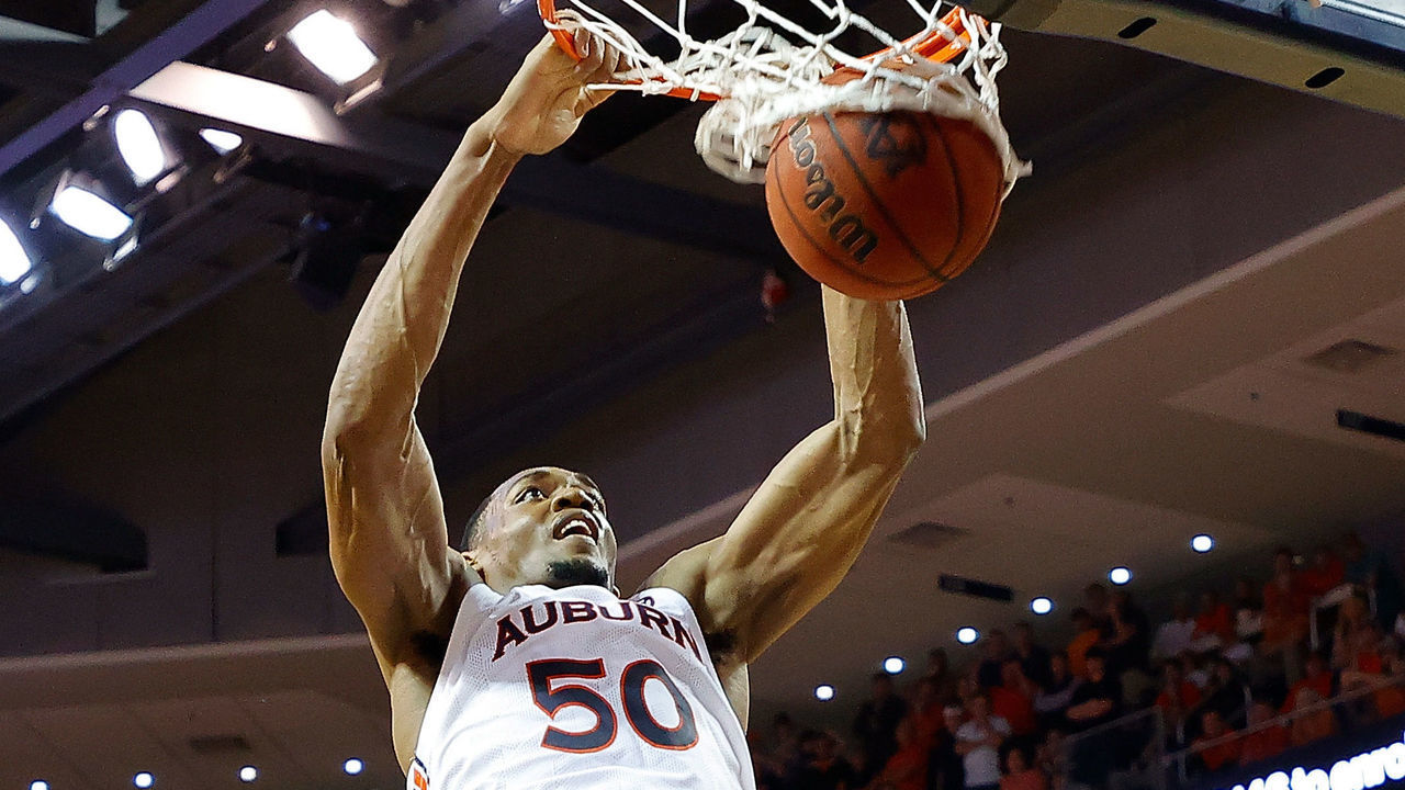 AUBURN, ALABAMA - FEBRUARY 12: Austin Wiley #50 of the Auburn Tigers dunks in overtime against the Alabama Crimson Tide at Auburn Arena on February 12, 2020 in Auburn, Alabama.