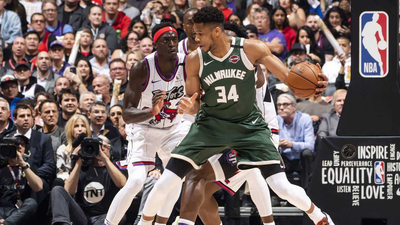 TORONTO, CANADA - FEBRUARY 25: Giannis Antetokounmpo #34 of the Milwaukee Bucks handles the ball against the Toronto Raptors on February 25, 2020 at the Scotiabank Arena in Toronto, Ontario, Canada. Mandatory Copyright Notice: Copyright 2020 NBAE