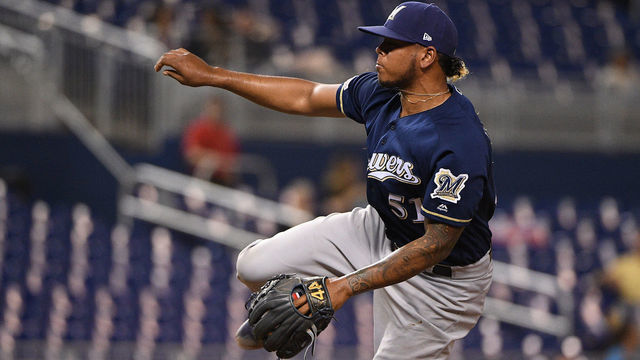MIAMI, FLORIDA - SEPTEMBER 09: Freddy Peralta #51 of the Milwaukee Brewers delivers a pitch against the Miami Marlins at Marlins Park on September 09, 2019 in Miami, Florida.