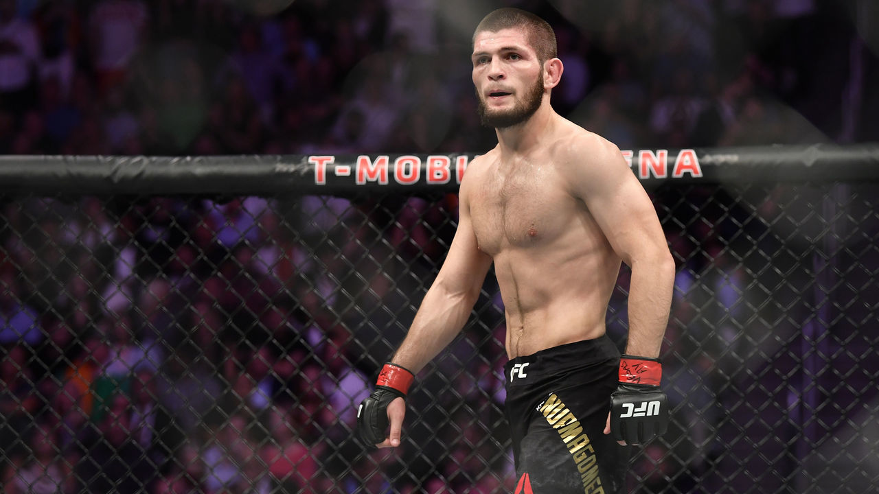 LAS VEGAS, NV - OCTOBER 06: Khabib Nurmagomedov of Russia stares across at Conor McGregor of Ireland in their UFC lightweight championship bout during the UFC 229 event inside T-Mobile Arena on October 6, 2018 in Las Vegas, Nevada.