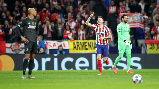 Atletico Madrid's Saul (centre) celebrates scoring his side's first goal of the game during the UEFA Champions League round of 16 first leg match at Wanda Metropolitano, Madrid.