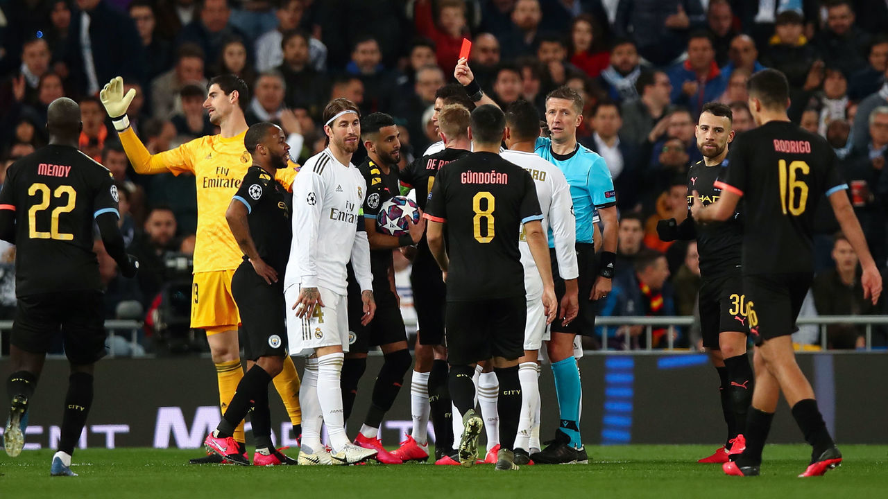 MADRID, SPAIN - FEBRUARY 26: Sergio Ramos of Real Madrid is shown a Red Card by Match referee Daniele Orsato of Italy during the UEFA Champions League round of 16 first leg match between Real Madrid and Manchester City at Bernabeu on February 26, 2020 in Madrid, Spain.