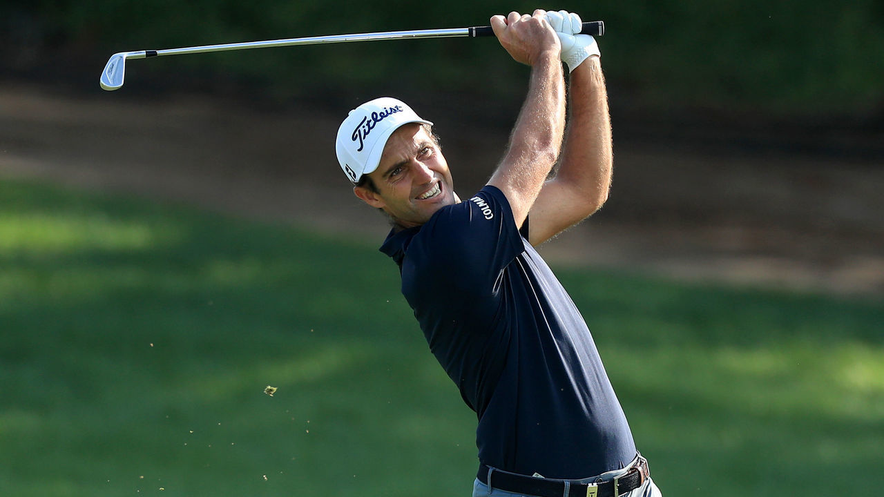 DUBAI, UNITED ARAB EMIRATES - JANUARY 23: Edoardo Molinari of Italy plays his second shot on the ninth hole during the first round of the Omega Dubai Desert Classic on the Majlis Course at The Emirates Golf Club on January 23, 2020 in Dubai, United Arab Emirates.