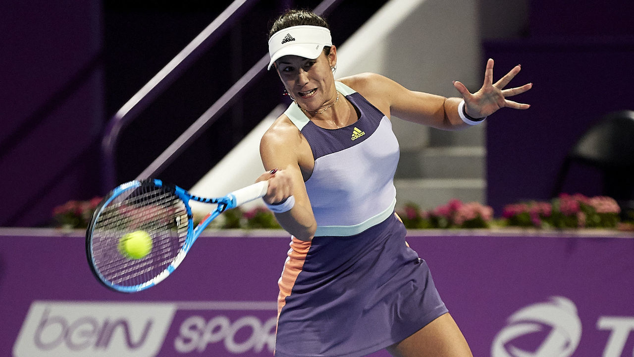 DOHA, QATAR - FEBRUARY 23: Garbine Muguruza of Spain returns the ball against Daria Kasatkina of Russia during day one of the WTA Qatar Total Open 2020 at Khalifa International Tennis and Squash Complex on February 23, 2020 , Qatar.