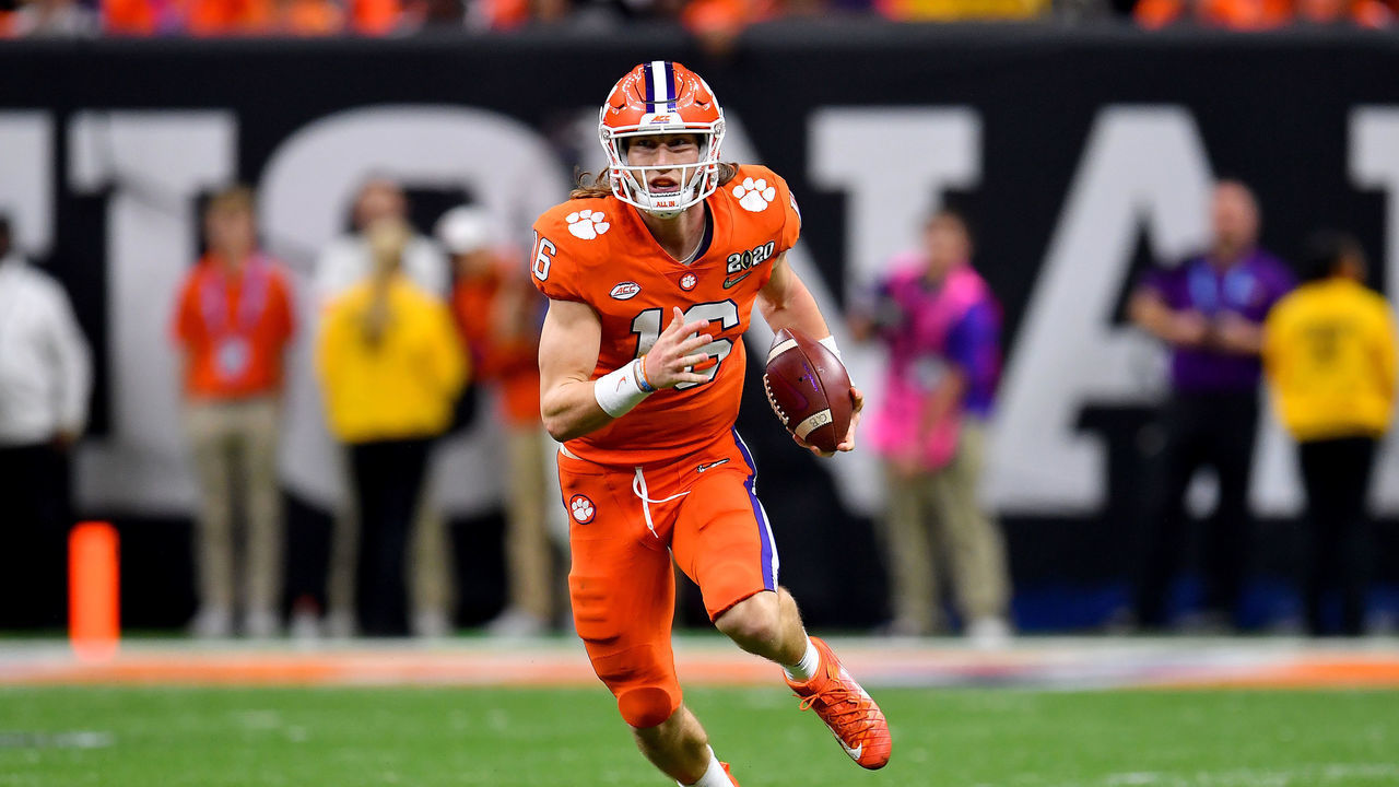 NEW ORLEANS, LOUISIANA - JANUARY 13: Trevor Lawrence #16 of the Clemson Tigers runs with the ball during the fourth quarter of the College Football Playoff National Championship game against the LSU Tigers at the Mercedes Benz Superdome on January 13, 2020 in New Orleans, Louisiana. The LSU Tigers topped the Clemson Tigers, 42-25.