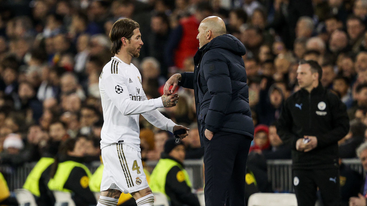 MADRID, SPAIN - FEBRUARY 26: (L-R) Sergio Ramos of Real Madrid, coach Zinedine Zidane of Real Madrid during the UEFA Champions League match between Real Madrid v Manchester City at the Santiago Bernabeu on February 26, 2020 in Madrid Spain