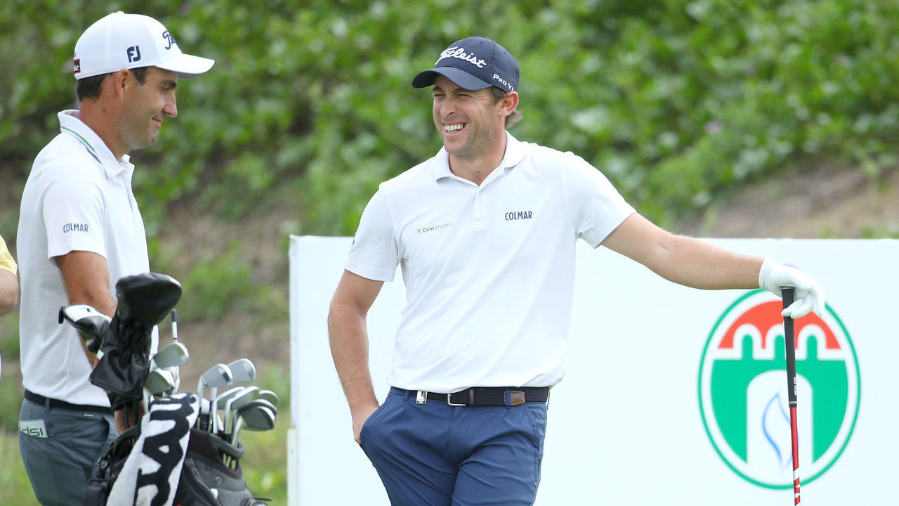 MUSCAT, OMAN - FEBRUARY 27: Edoardo Molinari and Lorenzo Gagli of Italy talk to each other at the second tee during Day 1 of the Oman Open at Al Mouj Golf Complex on February 27, 2020 in Muscat, Oman. Molinari and fellow Italian golfer Gagli were tested for coronavirus with results coming back negative.