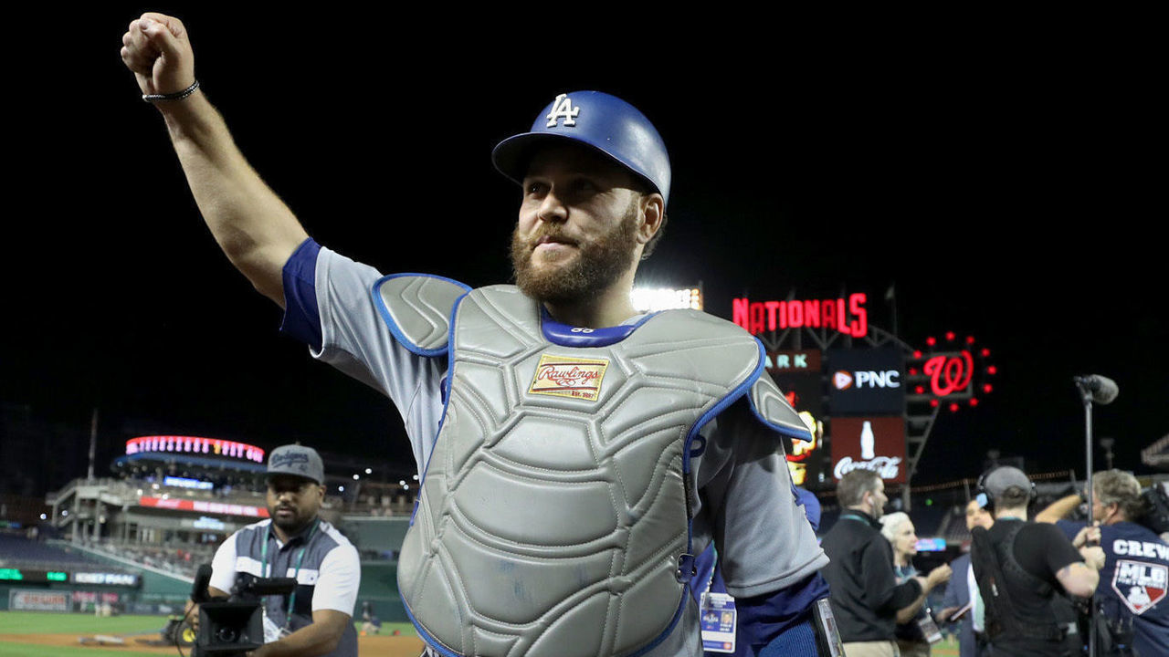 WASHINGTON, DC - OCTOBER 06: Catcher Russell Martin #55 of the Los Angeles Dodgers acknowledges the crowd after the Dodgers defeated the Washington Nationals 10-4 in Game 3 of the NLDS to go up two games to one at Nationals Park on October 06, 2019 in Washington, DC.