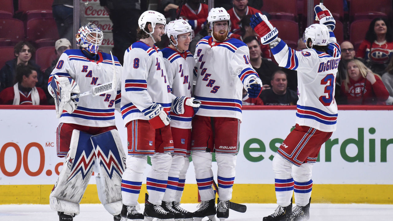MONTREAL, QC - FEBRUARY 27: Ryan Strome #16 of the New York Rangers (C) celebrates an empty net goal with teammates Alexandar Georgiev #40, Jacob Trouba #8, Marc Staal #18 and Phillip Di Giuseppe #33 against the Montreal Canadiens during the third period at the Bell Centre on February 27, 2020 in Montreal, Canada. The New York Rangers defeated the Montreal Canadiens 5-2.