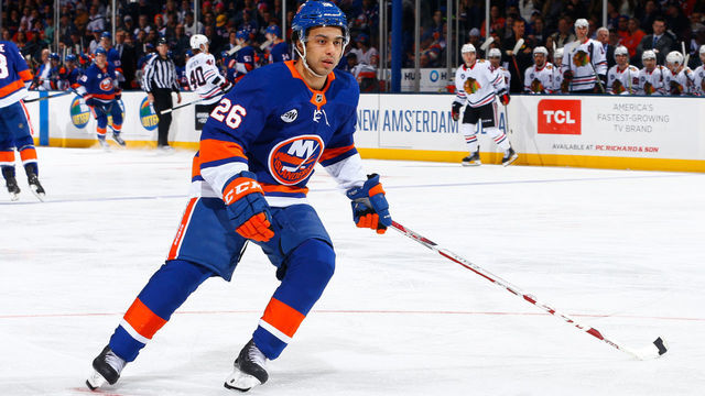 UNIONDALE, NY - JANUARY 03: Joshua Ho-Sang #26 of the New York Islanders skates agaknst the Chicago Blackhawks at Nassau Veterans Memorial Coliseum on January 3, 2019 in Uniondale, New York. New York Islanders defeated the Chicago Blackhawks 4-3 in overtime.