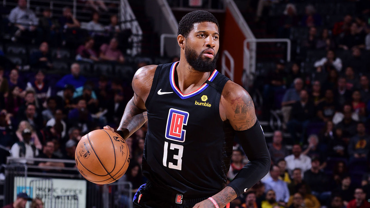 PHOENIX, AZ - FEBRUARY 26: Paul George #13 of the LA Clippers handles the ball against the Phoenix Suns on February 26, 2020 at Talking Stick Resort Arena in Phoenix, Arizona. Mandatory Copyright Notice: Copyright 2020 NBAE