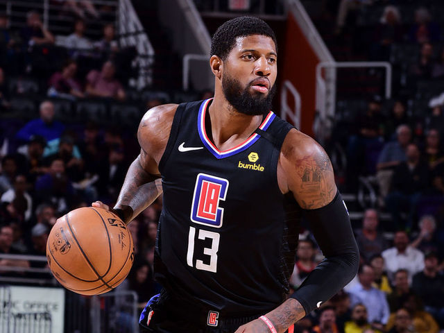 PHOENIX, AZ - FEBRUARY 26: Paul George #13 of the LA Clippers handles the ball against the Phoenix Suns on February 26, 2020 at Talking Stick Resort Arena in Phoenix, Arizona. Mandatory Copyright Notice: Copyright 2020 NBAE