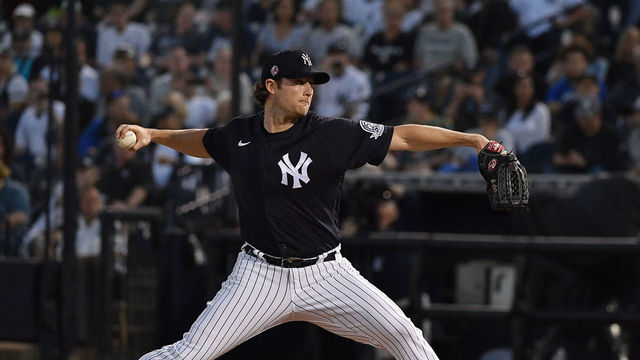 TAMPA, FLORIDA - FEBRUARY 24: Gerrit Cole #45 of the New York Yankees delivers a pitch in the first inning during the spring training game against the Pittsburgh Pirates at Steinbrenner Field on February 24, 2020 in Tampa, Florida.