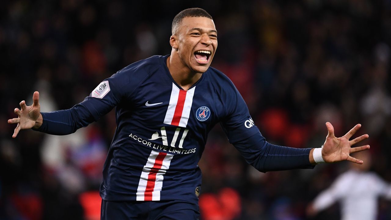 Paris Saint-Germain's French forward Kylian Mbappe celebrates after scoring a goal during the French L1 football match between Paris Saint-Germain (PSG) and Dijon, on February 29, 2020 at the Parc des Princes stadium in Paris.