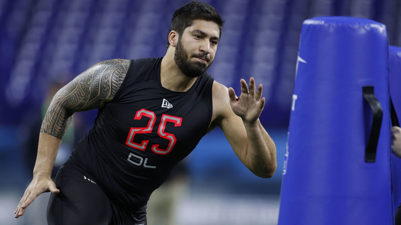 INDIANAPOLIS, IN - FEBRUARY 29: Defensive lineman A.J. Epenesa of Iowa runs a drill during the NFL Combine at Lucas Oil Stadium on February 29, 2020 in Indianapolis, Indiana.