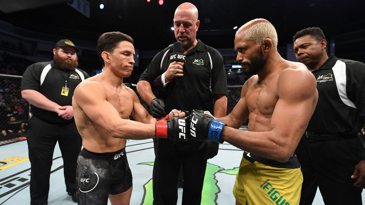 NORFOLK, VA - FEBRUARY 29: (L-R) Joseph Benavidez and Deiveson Figueiredo touch gloves prior to their flyweight championship bout during the UFC Fight Night event at Chartway Arena on February 29, 2020 in Norfolk, Virginia.