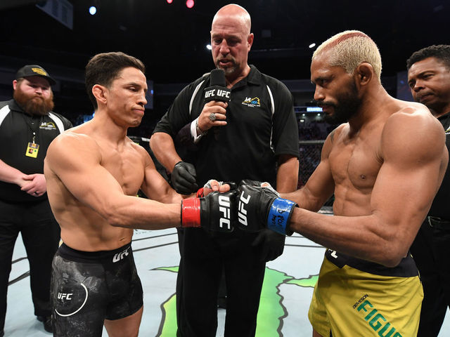 NORFOLK, VA - FEBRUARY 29: (L-R) Joseph Benavidez and Deiveson Figueiredo touch gloves prior to their flyweight championship bout during the UFC Fight Night event at Chartway Arena on February 29, 2020 in Norfolk, Virginia.