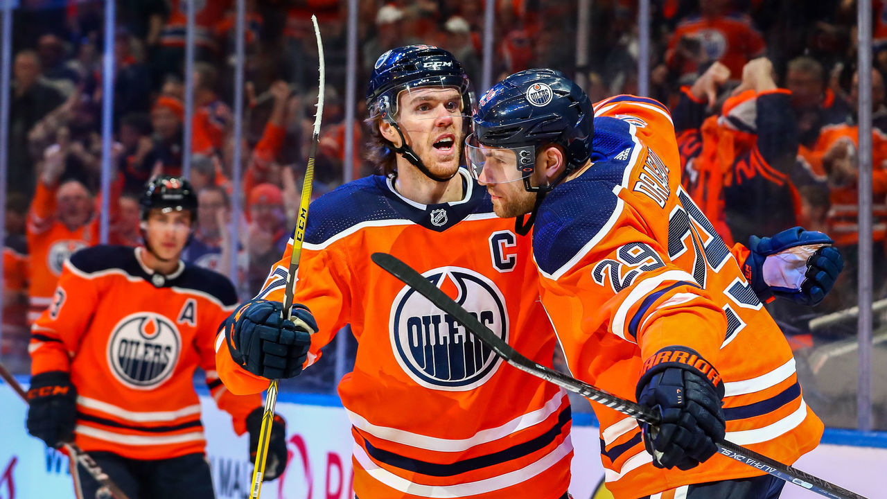 EDMONTON, AB - FEBRUARY 29: Edmonton Oilers Center Leon Draisaitl (29) celebrates his 100th point with Edmonton Oilers Center Connor McDavid (97) in the first period during the Edmonton Oilers game versus the Winnipeg Jets on February 29, 2020 at Rogers Place in Edmonton, AB.