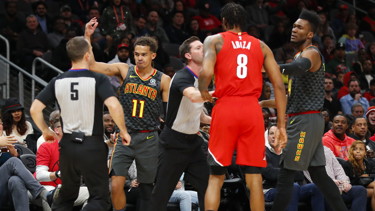 ATLANTA, GA - FEBRUARY 29: Trevor Ariza #8 of the Portland Trail Blazers is called for a flagrant foul against Trae Young #11 of the Atlanta Hawks during the second half of an NBA game at State Farm Arena on February 29, 2020 in Atlanta, Georgia. NOTE TO USER: User expressly acknowledges and agrees that, by downloading and/or using this photograph, user is consenting to the terms and conditions of the Getty Images License Agreement.