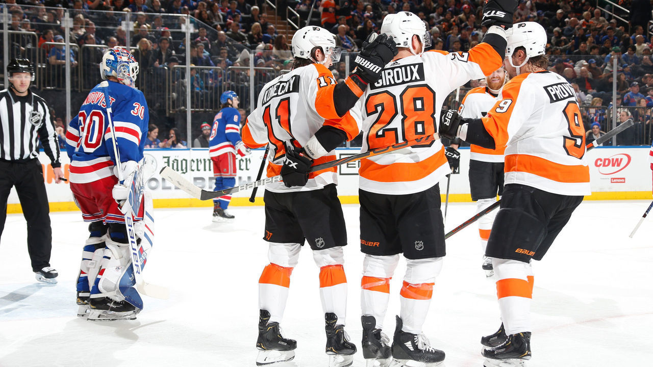 NEW YORK, NY - MARCH 01: Travis Konecny #11 of the Philadelphia Flyers celebrates with teammates after scoring a goal in the second period against Henrik Lundqvist #30 of the New York Rangers at Madison Square Garden on March 1, 2020 in New York City.