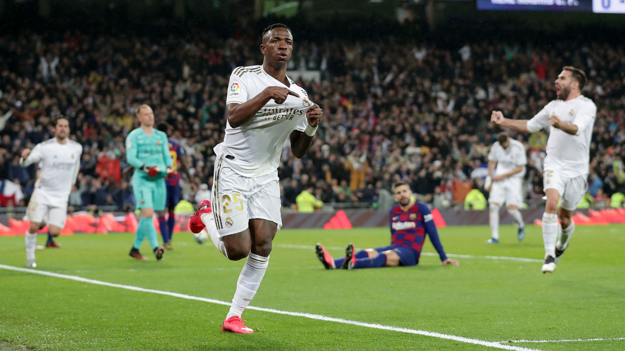 MADRID, SPAIN - MARCH 01: Vinicius Junior of Real Madrid celebrates after scoring his team's first goal during the Liga match between Real Madrid CF and FC Barcelona at Estadio Santiago Bernabeu on March 01, 2020 in Madrid, Spain.