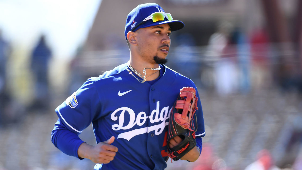GLENDALE, ARIZONA - FEBRUARY 26: Mookie Betts #50 of the Los Angeles Dodgers runs back to the dugout from right field during a spring training game against the Los Angeles Angels at Camelback Ranch on February 26, 2020 in Glendale, Arizona.
