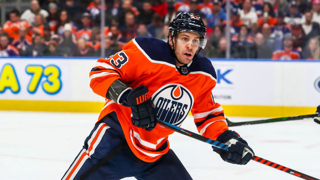 EDMONTON, AB - FEBRUARY 29: Edmonton Oilers Left Wing Tyler Ennis (63) skates for a loose puck in the first period during the Edmonton Oilers game versus the Winnipeg Jets on February 29, 2020 at Rogers Place in Edmonton, AB.