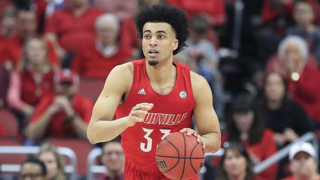 LOUISVILLE, KENTUCKY - MARCH 01: Jordan Nwora #33 of the Louisville Cardinals dribbles the ball against the Virginia Tech Hokies at KFC YUM! Center on March 01, 2020 in Louisville, Kentucky.