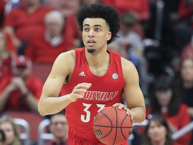 LOUISVILLE, KENTUCKY - MARCH 01: Jordan Nwora #33 of the Louisville Cardinals dribbles the ball against the Virginia Tech Hokies at KFC YUM! Center on March 01, 2020 in Louisville, Kentucky.