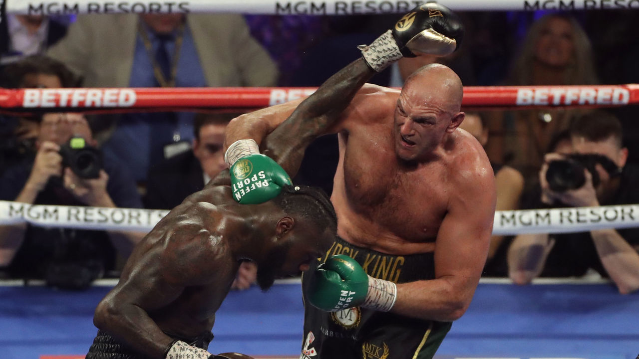 Tyson Fury (right) and Deontay Wilder during the World Boxing Council World Heavy Title bout at the MGM Grand, Las Vegas.