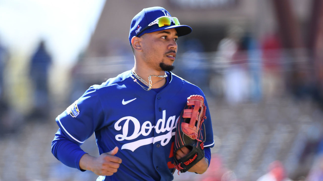 GLENDALE, ARIZONA - FEBRUARY 26: Mookie Betts #50 of the Los Angeles Dodgers runs back to the dugout from right field during a spring training game against the Los Angeles Angels at Camelback Ranch on February 26, 2020 in Glendale, Arizona.