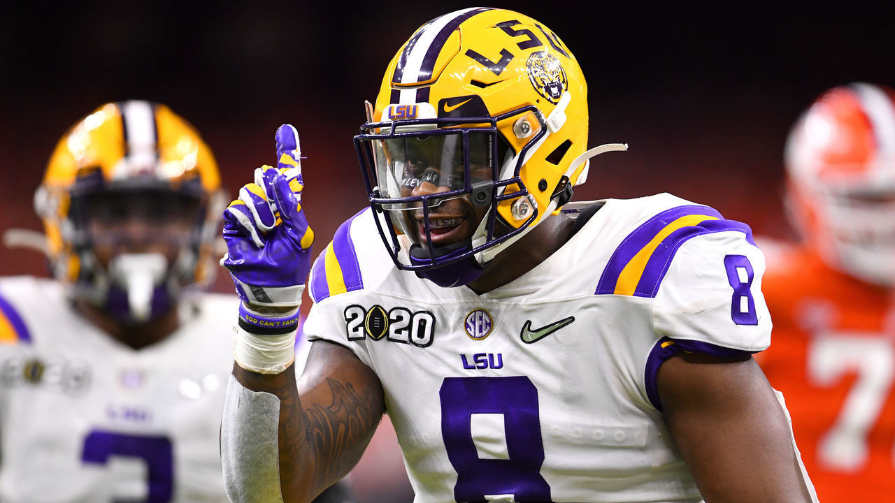 NEW ORLEANS, LA - JANUARY 13: Patrick Queen #8 of the LSU Tigers celebrates a defensive stop against the Clemson Tigers during the College Football Playoff National Championship held at the Mercedes-Benz Superdome on January 13, 2020 in New Orleans, Louisiana.