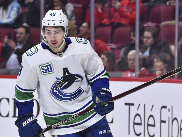 MONTREAL, QC - FEBRUARY 25: Quinn Hughes #43 of the Vancouver Canucks skates against the Montreal Canadiens during the second period at the Bell Centre on February 25, 2020 in Montreal, Canada. The Vancouver Canucks defeated the Montreal Canadiens 4-3 in overtime.