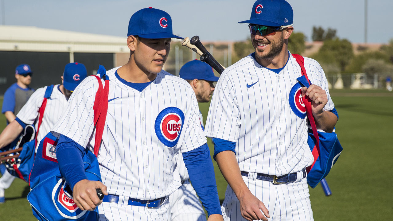 MESA, AZ - FEBRUARY 18: Anthony Rizzo #44 and Kris Bryant #17 of the Chicago Cubs joke around during workouts after Photo Day on Tuesday, February 18, 2020 at Sloan Park in Mesa, Arizona.