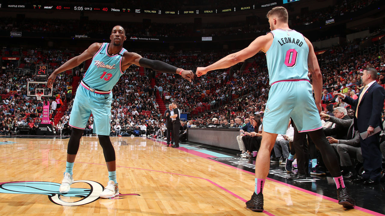 MIAMI, FL - FEBRUARY 3: Bam Adebayo #13 of the Miami Heat and Meyers Leonard #0 fist bump during the game against the Philadelphia 76ers on February 3, 2020 at American Airlines Arena in Miami, Florida. Mandatory Copyright Notice: Copyright 2020 NBAE