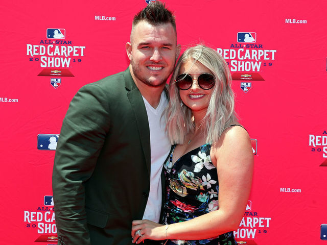 CLEVELAND, OH - JULY 09: Mike Trout #27 of the Los Angeles Angels poses for a photo with his wife Jessica Cox during the MLB Red Carpet Show presented by Chevrolet at Progressive Field on Tuesday, July 9, 2019 in Cleveland, Ohio.