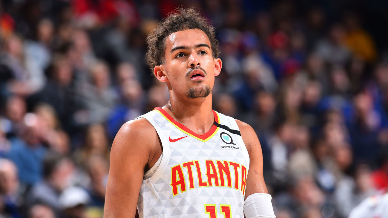 PHILADELPHIA, PA - FEBRUARY 24: Trae Young #11 of the Atlanta Hawks looks on during a game against the Philadelphia 76ers on February 24, 2020 at the Wells Fargo Center in Philadelphia, Pennsylvania NOTE TO USER: User expressly acknowledges and agrees that, by downloading and/or using this Photograph, user is consenting to the terms and conditions of the Getty Images License Agreement. Mandatory Copyright Notice: Copyright 2020 NBAE