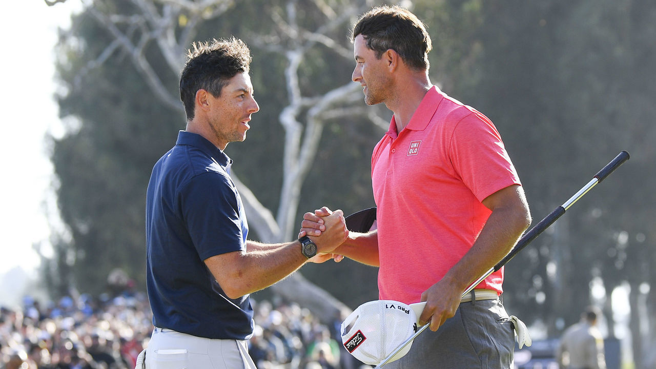 PACIFIC PALISADES, CA - FEBRUARY 16: Rory McIlroy shakes hands with Adam Scott on the 18th hole after the final round of The Genesis Invitational golf tournament at the Riviera Country Club in Pacific Palisades, CA on February 16, 2020.