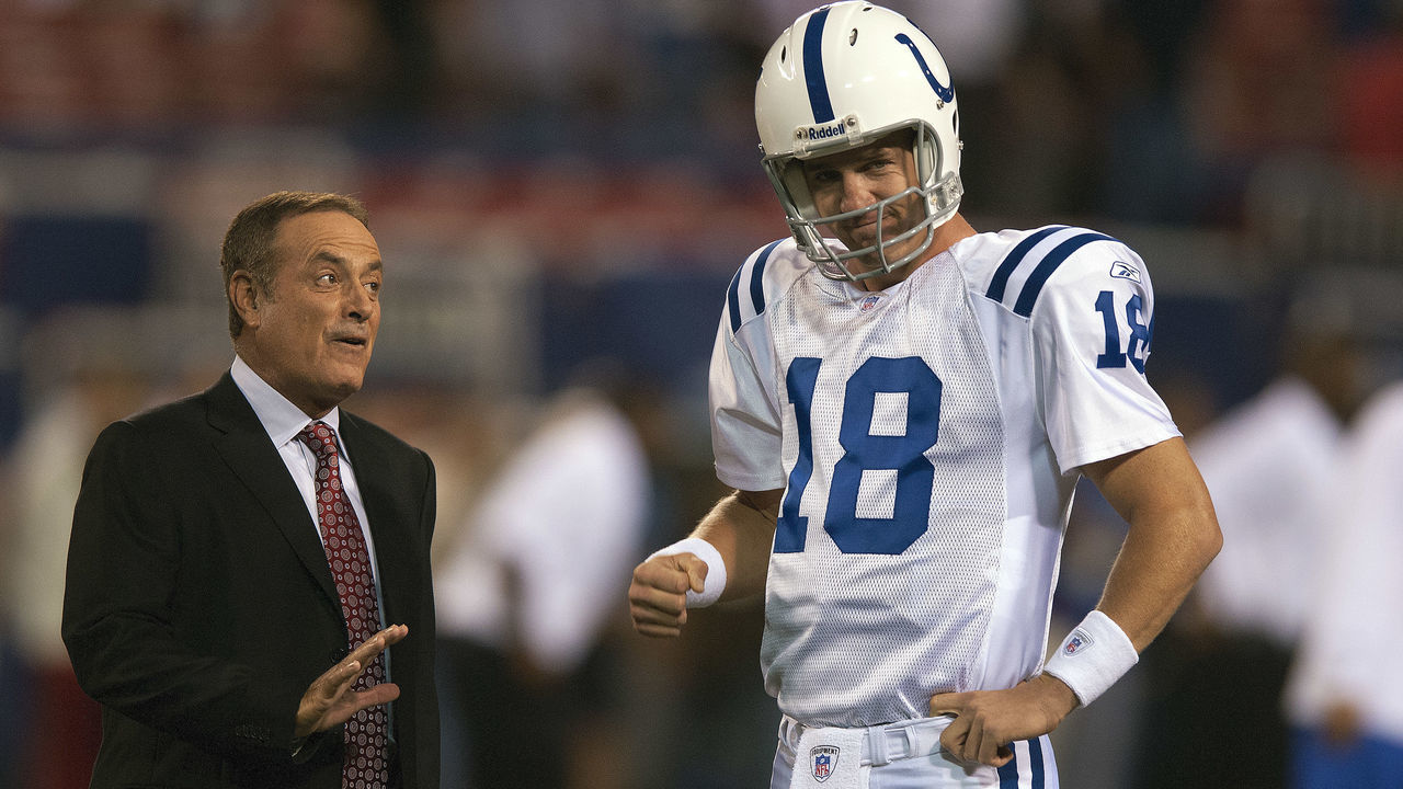 EAST RUTHERFORD, NJ - SEPTEMBER 10: Peyton Manning #18 of the Indianapolis Colts talks with ABC sportscaster Al Michaels prior to playing the New York Giants in an NFL football game at Giants Stadium on September 10, 2006 in East Rutherford, New Jersey.