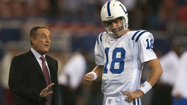 EAST RUTHERFORD, NJ - SEPTEMBER 10: Peyton Manning #18 of the Indianapolis Colts talks with ABC sportscaster Al Michaels prior to playing the New York Giants in an NFL football game at Giants Stadium on September 10, 2006 in East Rutherford, New Jersey.