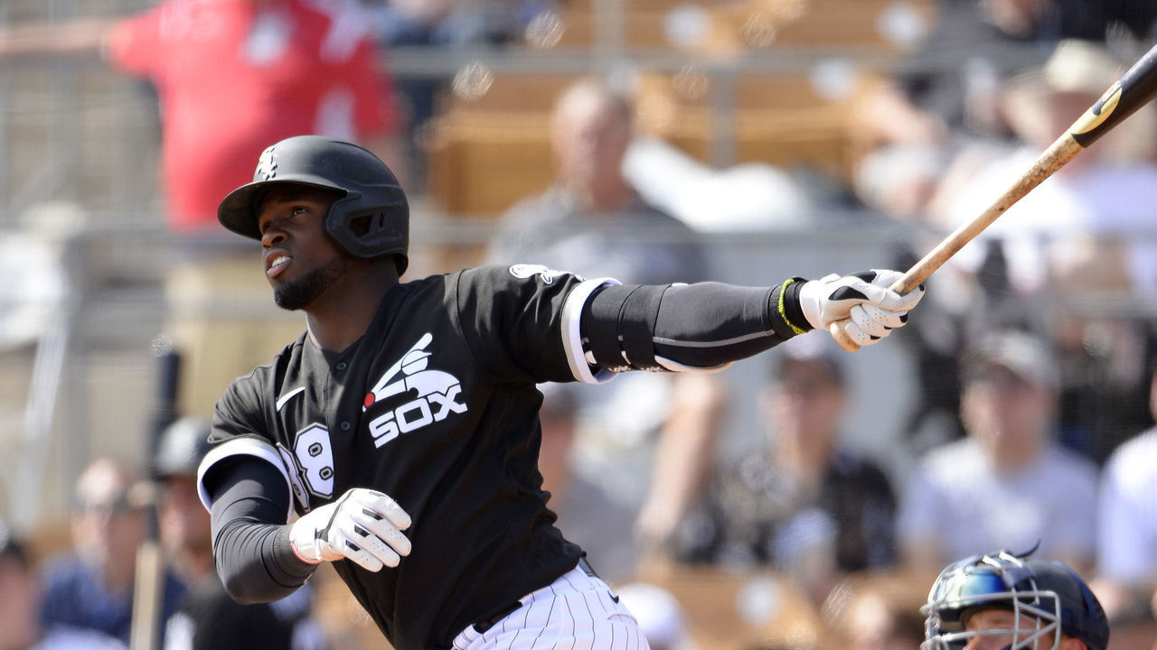 GLENDALE, ARIZONA - FEBRUARY 27: Luis Robert #88 of the Chicago White Sox bats against the Seattle Mariners on February 27, 2020 at Camelback Ranch in Glendale Arizona.