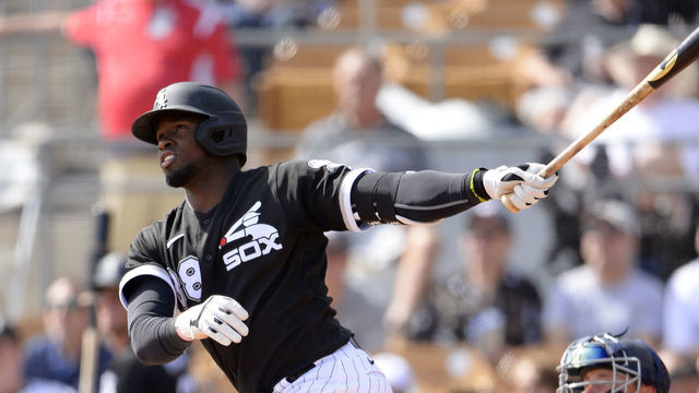 GLENDALE, ARIZONA - FEBRUARY 27: Luis Robert #88 of the Chicago White Sox bats against the Seattle Mariners on February 27, 2020 at Camelback Ranch in Glendale Arizona.